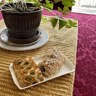 Bear claw and a feta cheese pastry delectable