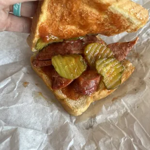 Inside of sausage sandwich.