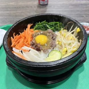 a bowl of food on a tray