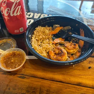 Shrimp lunch bowl. I&apos;m actually full already. The ginger sauce is flavorful and seems like maybe they make it here.