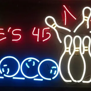 a neon sign for a bowling alley