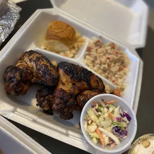 Jerk Chicken Special w/ dirty rice, coleslaw and roll $15
