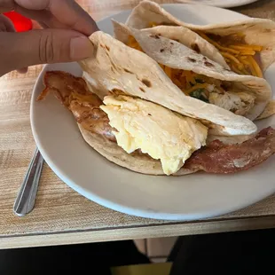 Bacon and Egg, Migas Con Todo, and Bean and Cheese