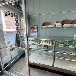 a display case with donuts