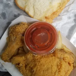 Fried chicken with fries mild sauce oin the side