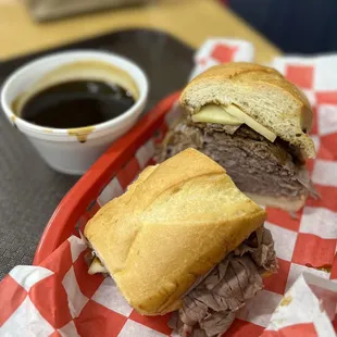 a roast beef sandwich with a side of coffee