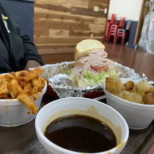 1/2 a turkey on Roll (part of combo for $13.95 inc side and soda), red pasta ($2.95 small) and potatoes ($2.95 small)