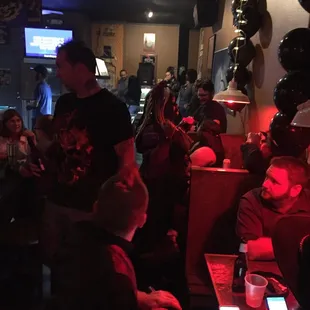 a group of people sitting at tables