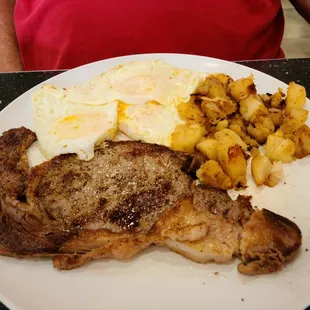 Steak and eggs with potatoes