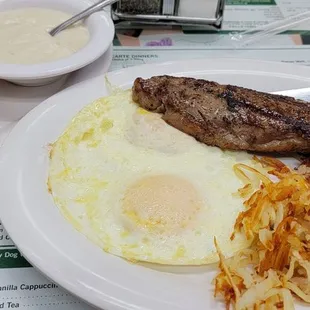 Steak, (2) eggs, hashbrowns, and biscuits &amp; gravy
