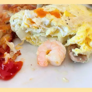 Inside look at the Shrimp and mushroom omelette $13.50
