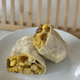 Green chili, egg, seasoned potatoes and cheese burritos
