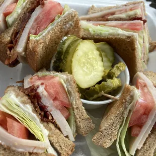 Neat and tidy club sandwich with perfect bacon (ask for it)