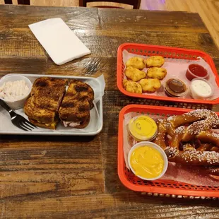 pastrami sandwich, pretzels, chicken nuggets