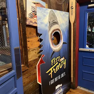 a shark coming out of the door