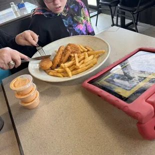 Chicken nuggets and fries