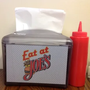 a tissue dispenser and a napkin dispenser