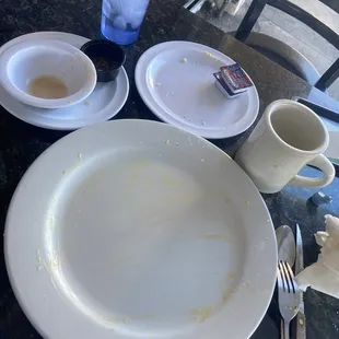 Chicken fried steak, perfectly prepared eggs, beans 'n rice, sourdough toast, and rich black coffee (after)