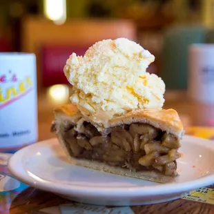 a slice of pie with ice cream