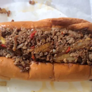 Philly cheesesteak with onions, green peppers, and cheese. My absolute favorite sub to eat.