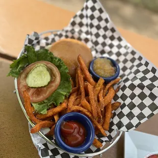 Farm burger with Swiss cheese and upgraded sweet potato fries