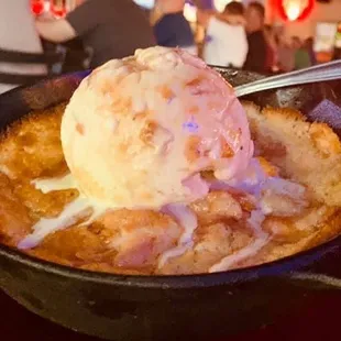 Homemade peach cobbler with homemade peach custard