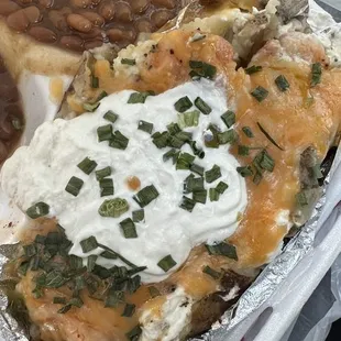 Shrimp baked potato and baked beans