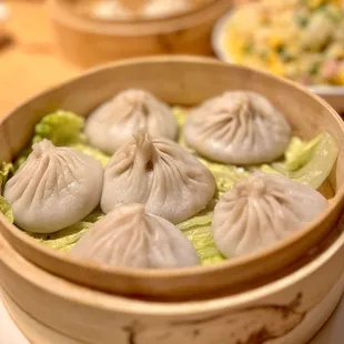 Pork Steamed Soup Buns (Chicken dumplings behind)