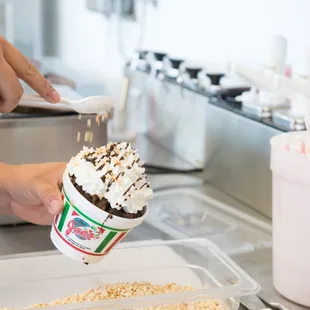Create your own Sundae with peanut butter cups, brownies, hot fudge, whipped cream, and/or much more!