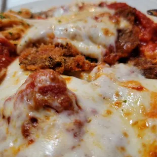 Veal Parmigiana with angel hair pasta.