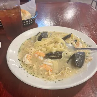 Seafood combo. Shrimp and clams in butter wine sauce.  Very good