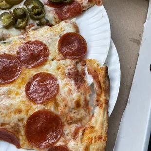 two slices of pepperoni pizza