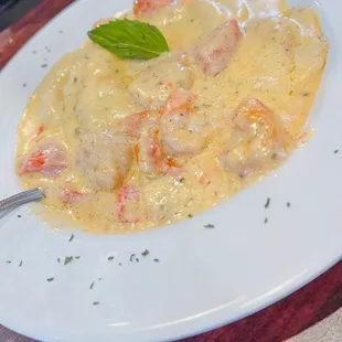 Lobster Ravioli with tomatoes and shrimp