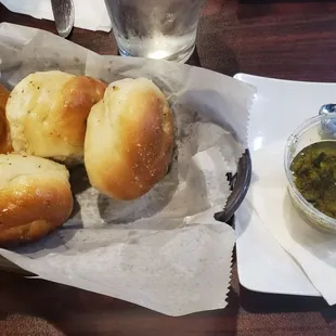 Garlic pull apart rolls with dipping sauce. So good!!