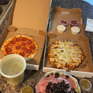 two pizzas and a drink