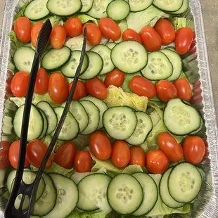 Catered salad "half" tray was $40.