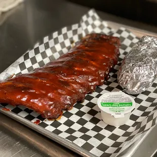 1/2 rack of ribs with baked potato