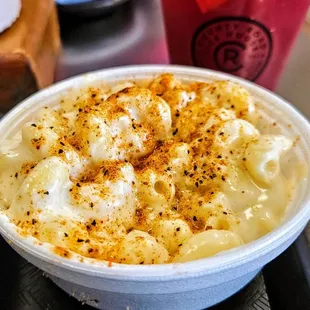 Mac and Cheese side. Tangy and amazing! Around $4 by itself. $1.50 extra with a dinner.