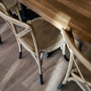 a wooden table and chairs