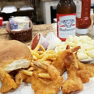 Tasty shrimp, fries and macaroni plate cold beers were yummy also ....