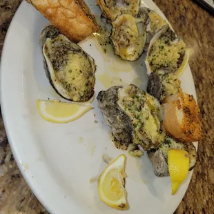 Half eaten .. but these Broiled Oysters were great!! Ordered 6 then ordered 18 more. And met Joe great guy .. support this guy.