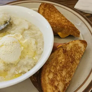 Grilled ham and cheese sandwich with grits