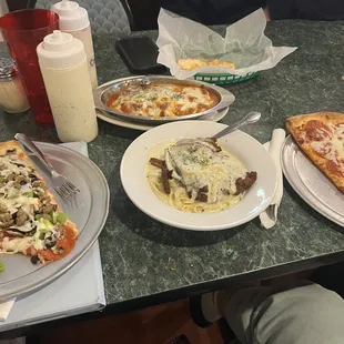 a slice of pizza on a plate