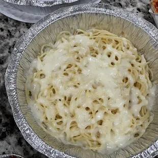 Kid's spaghetti with butter and cheese instead of marinara