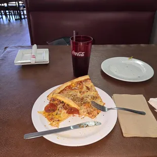 Two slices, small salad and fountain drink lunch special for $9.99!