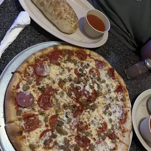 Stromboli and meatlovers pizza.