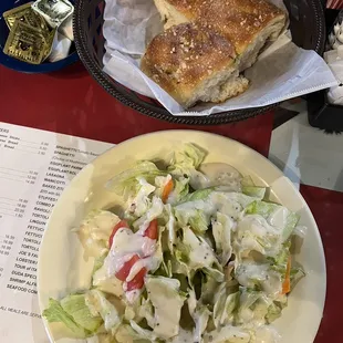 Free bread with most meals.   Caesar salad that came with entree.