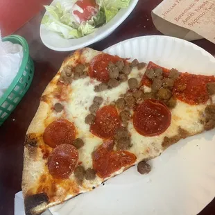 Pepperoni and Sausage Pizza Slice