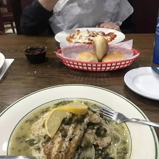 Chicken Picatta, garlic rolls and pick 3 pastas