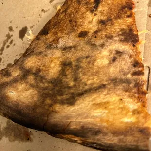 a slice of pizza in a box